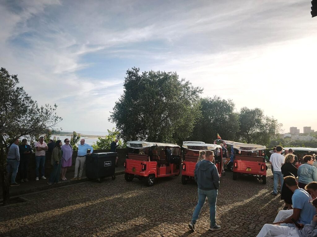 Invictuk Tours electric tuk tuks at a Douro river viewpoint at sunset